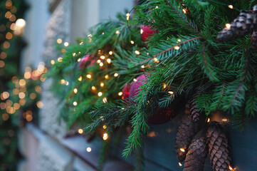 Festive pine tree decoration captured with a cozy, bokeh-filled background
