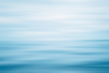 Abstract ocean horizon with soft blue and white horizontal streaks