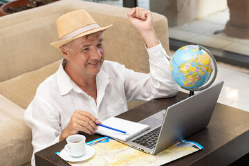 Freelancer celebrating project success while working remotely in a cozy setting