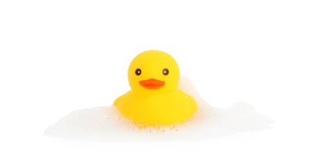 One cute rubber duck and foam isolated on white