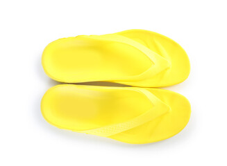 Yellow flip-flops isolated on white, top view. Beach accessory