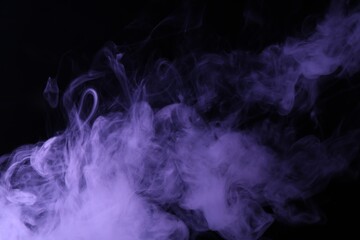 Hookah smoke in violet light on black background, closeup