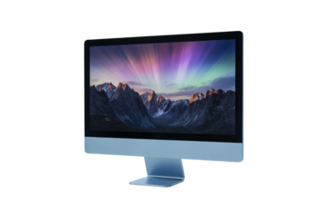 Modern computer monitor displaying a vibrant aurora borealis over snow capped mountains