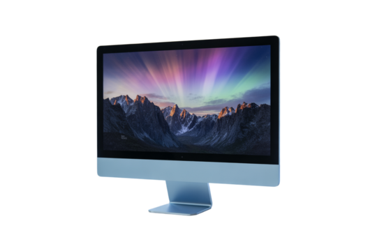 Modern computer monitor displaying a vibrant aurora borealis over snow capped mountains