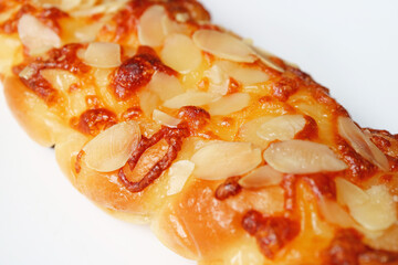 Closeup of Mouthwatering Cheesy Homemade Almond Twist Bread