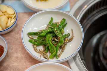 korean side dish food. stir fried anchovies with chili peppers
