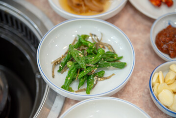korean side dish food. stir fried anchovies with chili peppers
