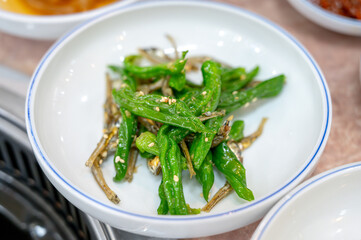 korean side dish food. stir fried anchovies with chili peppers
