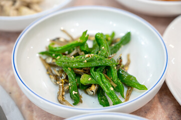 korean side dish food. stir fried anchovies with chili peppers
