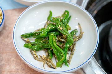korean side dish food. stir fried anchovies with chili peppers
