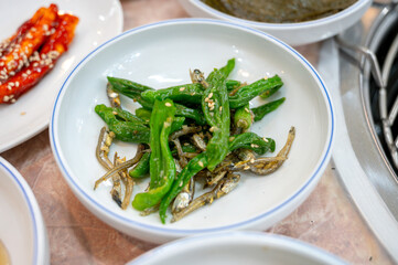 korean side dish food. stir fried anchovies with chili peppers
