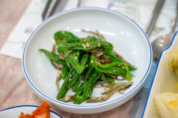 korean side dish food. stir fried anchovies with chili peppers
