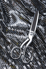 Reflective metallic spangle fabric with dazzling surface—ideal for glam fashion, festive design,...