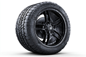 Obraz premium An isolated clean black tire with a sleek alloy rim is displayed, emphasizing its design and tread pattern, perfect for automotive enthusiasts