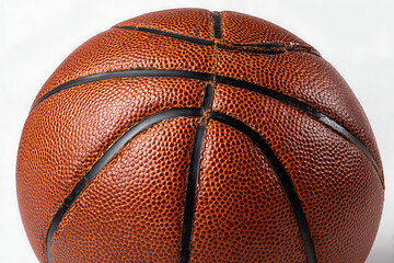 Fototapeta premium Textured orange basketball with black seams brown