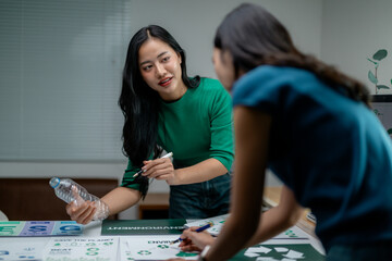 Two women collaborating on an environmental project