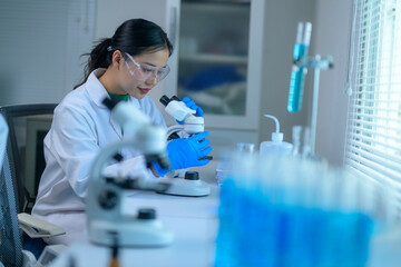Researcher analyzing specimens in a modern laboratory setting
