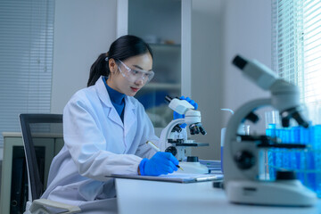 Researcher analyzing samples in a laboratory setting