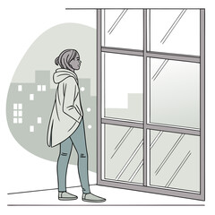 A solitary person wearing a hooded jacket and jeans stands with hands in pockets looking out a large window at a cityscape at dusk