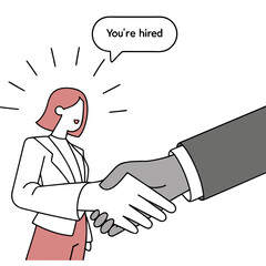 A smiling woman in a suit shakes hands with a person in a suit signifying a successful job offer and employment