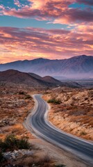 Serene Desert Road at Sunset with Colorful Sky and Scenic Mountain Landscape in the Background