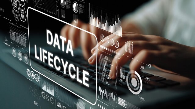 Hands Typing on Keyboard with Data Lifecycle Concept Illustrations and Digital Graphics on Screen Background. Asymptotic smart data analytic.