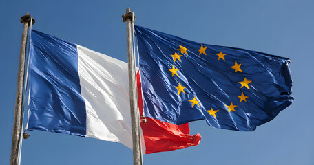 The flags of France and the European Union waving together on a clear day