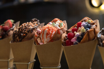 Delicious assortment of ice cream cones served at a local dessert shop
