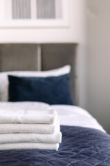 Comfortable hotel suite featuring cozy bed and fresh linens in morning light