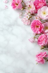 Elegant pink floral arrangement on marble background; perfect for delicate designs and feminine aesthetics