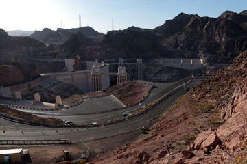 Panoramic view of Hoover Dam. The dam, parking lots and rocks around the dam are clearly visible