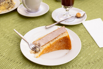 a piece of sweet pie on a plate in a café
