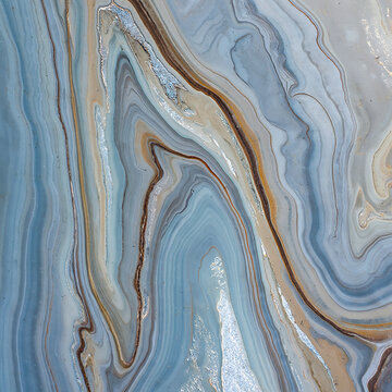 Abstract flowing lines of blue gray and gold create a natural stone texture