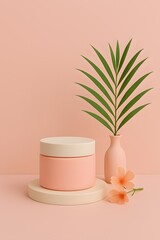 Pink cosmetic jar with beige lid on a platform with green palm leaf and flowers