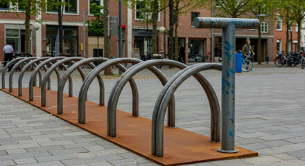 Naklejka premium Street Furniture Modern Bicycle Rack Design in City Streetscape Sustainable Urban Cycling Infrastructure