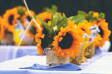 Bouquet of sunflowers on a table at a wedding in Golden Gate Park.