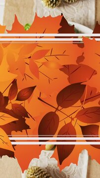 Animation of white frame and autumn leaves over thanksgiving dinner background