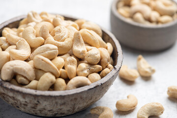 Dry cashes in bowl closeup view