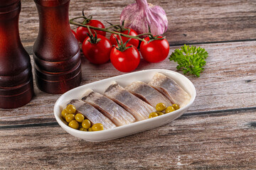 Slided marinated salted herring fillet