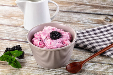 Organic tasty dairy yoghurt with blackberry