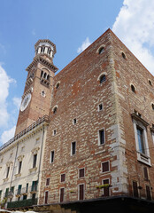 Torre dei Lamberti Tower with Clock in Verona, Italy in the Romanesque Style