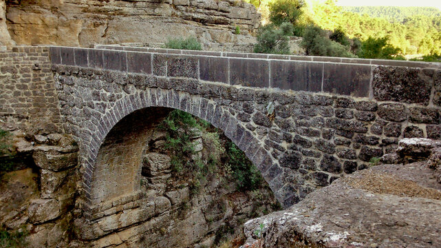 "The Oluk Bridge" in "K&ouml;pr&uuml;l&uuml; Canyon" connecting the remains of the ancient stone road connecting Selge Ancient City to Pamphlia