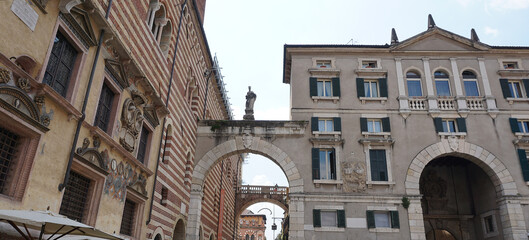 Street view of Piazza Dei Signori Verona city Italy in front of historical building Palace of the...