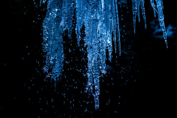Melting Icicles illuminated with light