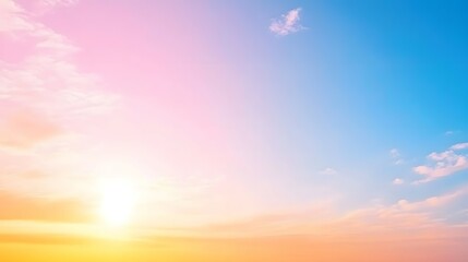 Sky with pastel colors: pink yellow orange and blue gradient with clouds.
