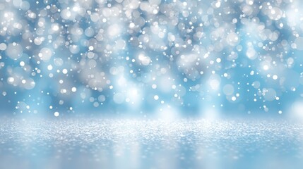 Fototapeta premium Glittering silver and blue bokeh pattern creating magical winter ambiance with sparkling light blurs and soft iridescent textures