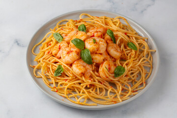 Pasta spaghetti with spicy tomato sauce arrabbiata and shrimp
