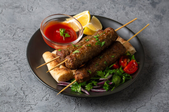 Homemade lula kebab with vegetables