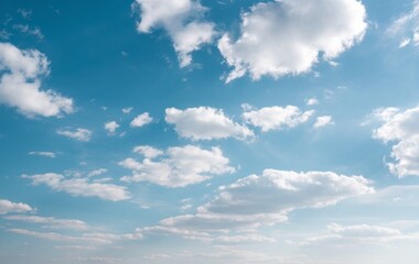 Obraz premium A clear blue sky with fluffy white clouds