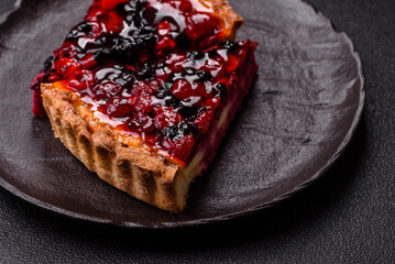 Pie, cheesecake with mascarpone, raspberries and blackberries. Cheesecake with cheese